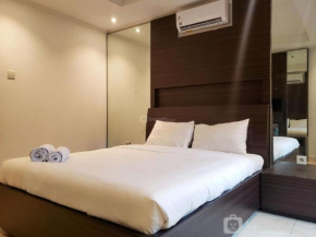 Minimalist and Comfy 1BR at The Boulevard Apartment By Travelio